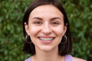 Patient learning about the health and confidence benefits of orthodontics